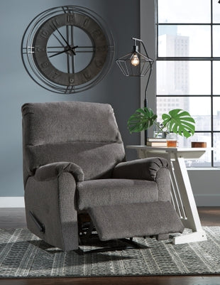 Open Ashley Nerviano manual recliner showing plush fabric upholstery and reclining mechanism in a relaxed position.