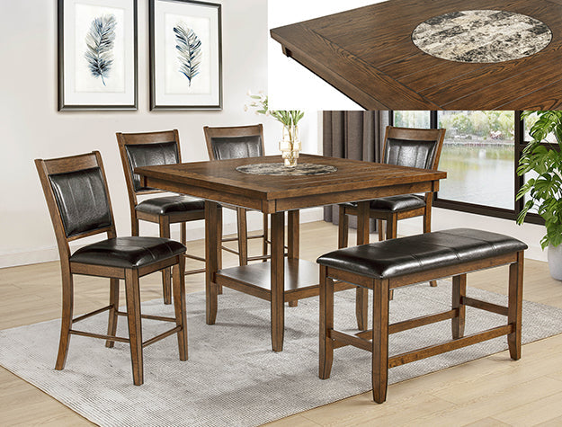 Counter height dining group by BoxDrop Suwanee featuring a sturdy table and matching chairs in a modern design.