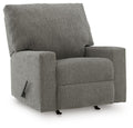 Ashley Newellen manual recliner in dark brown leather with plush cushioning and a classic design, viewed from an angle.