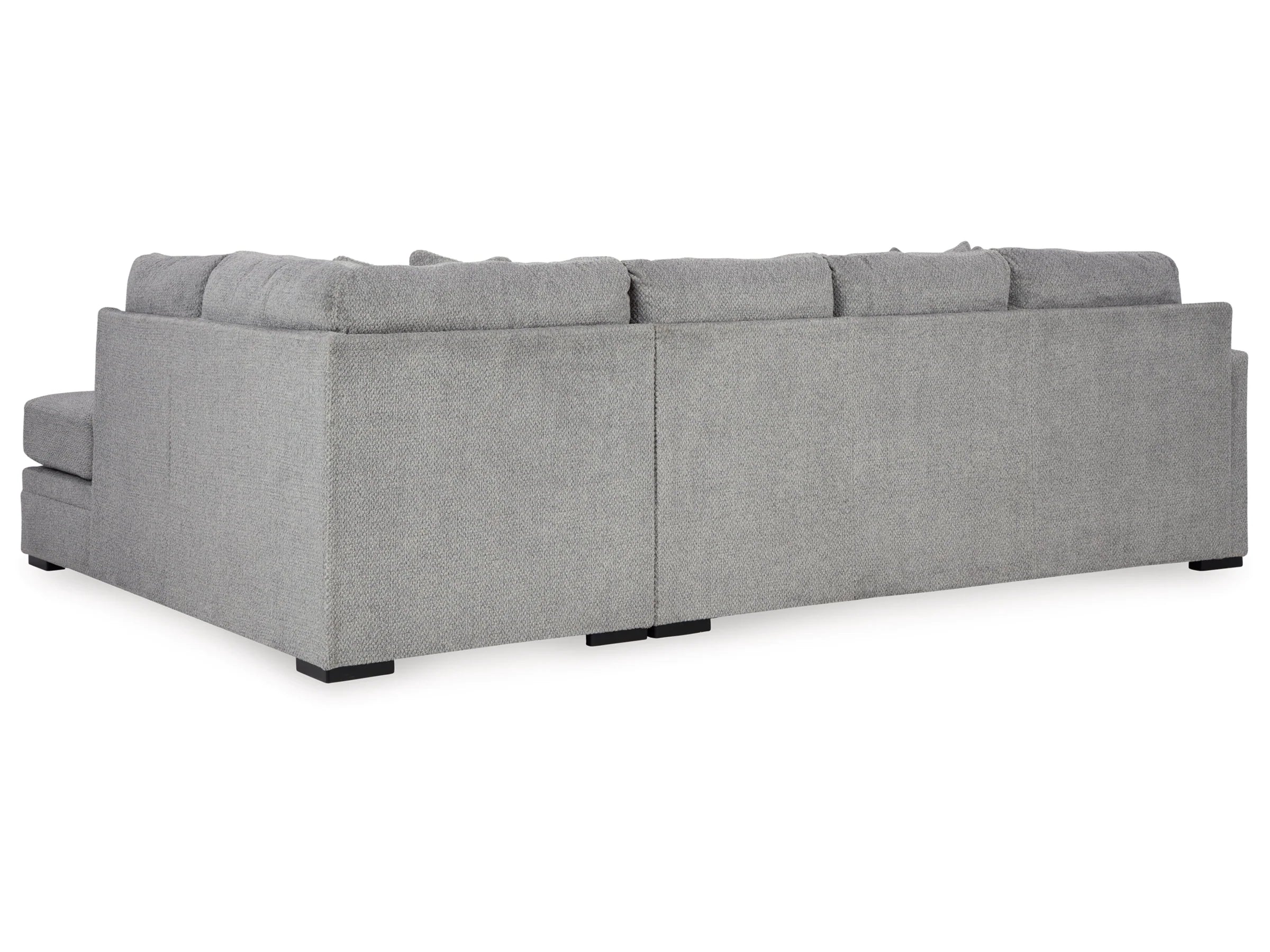 Grey plush U-shaped sectional sofa by Ashley, showing the back view with plush fabric and spacious seating for living room comfort.