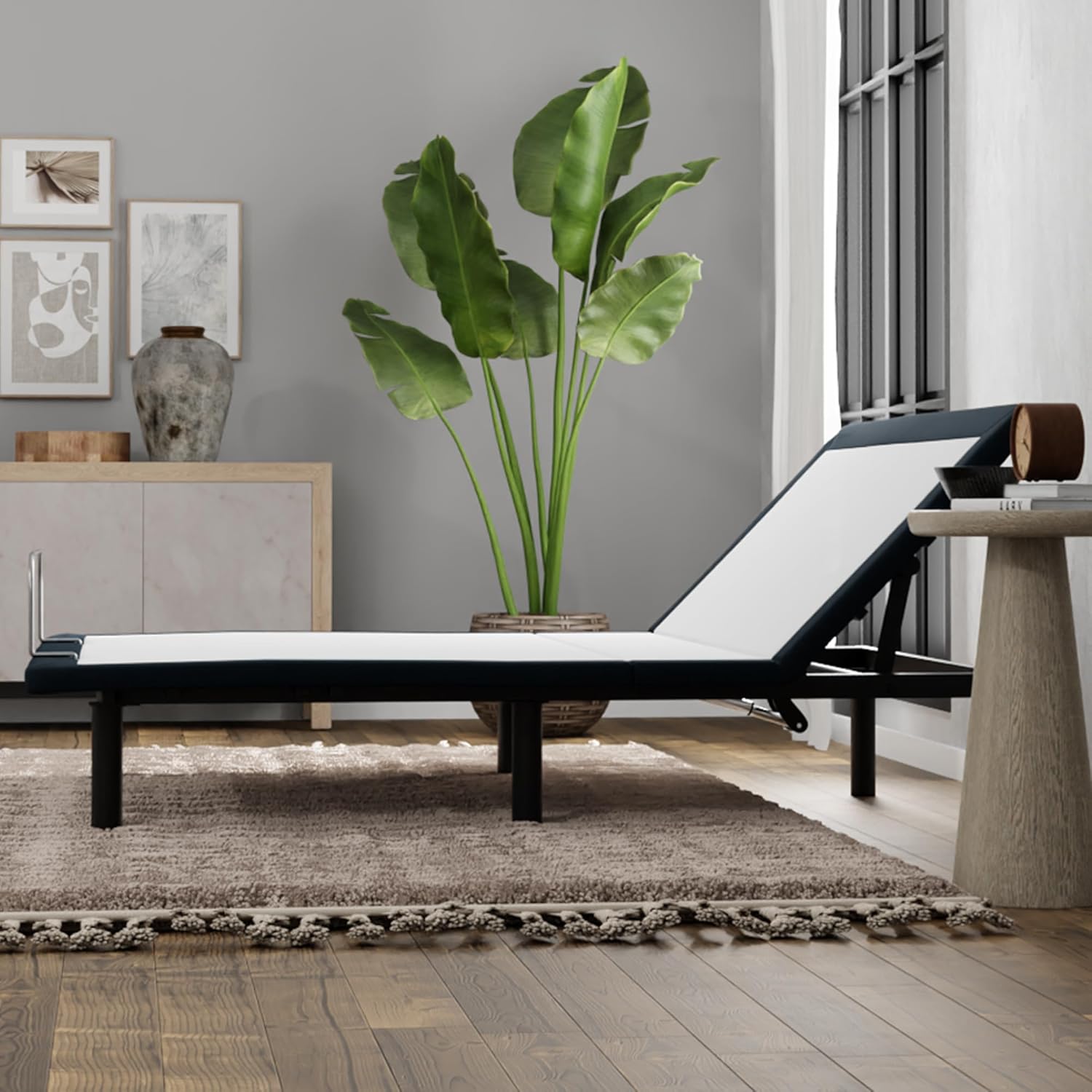 Adjustable BoxDrop Suwanee head-only adjustable base with remote control, featuring a sleek design for customized head elevation.