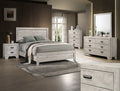 White bedroom furniture set from Crownmark's Millie Bedroom Group featuring a bed, dresser, and nightstand.