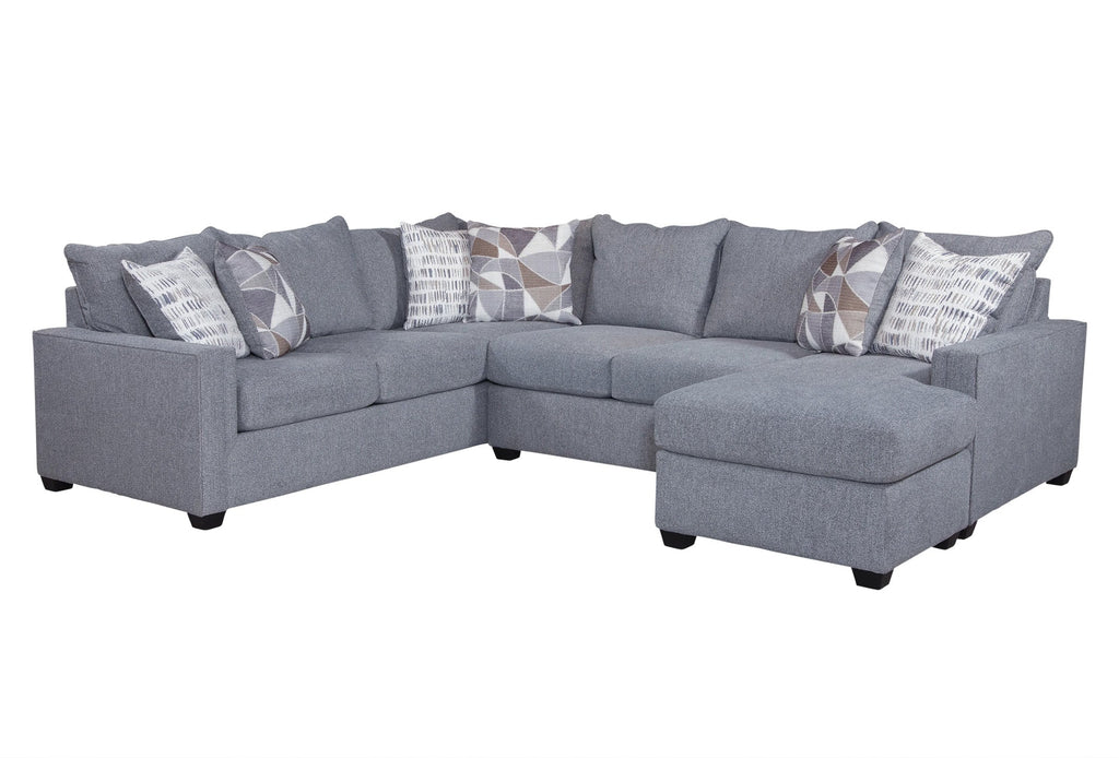 Light grey U-shaped sectional sofa by Ashley, showing plush upholstery and spacious seating in a modern living room setting.