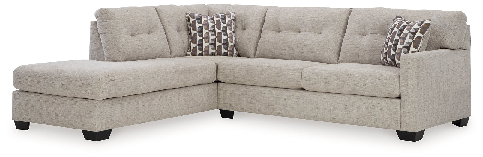 Beige Ashley L-shaped sectional sofa in a modern living room setting with plush cushions and wide armrests.