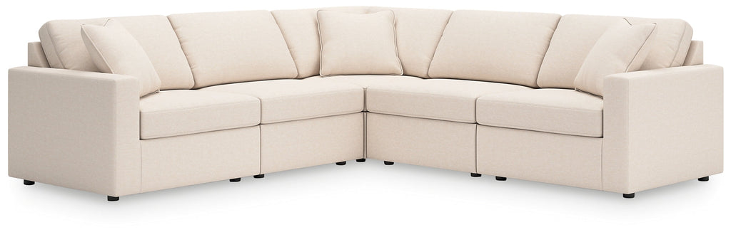Cream Ashley modular L-shaped sectional sofa with plush cushions and modern design, shown in a stylish living room setting.