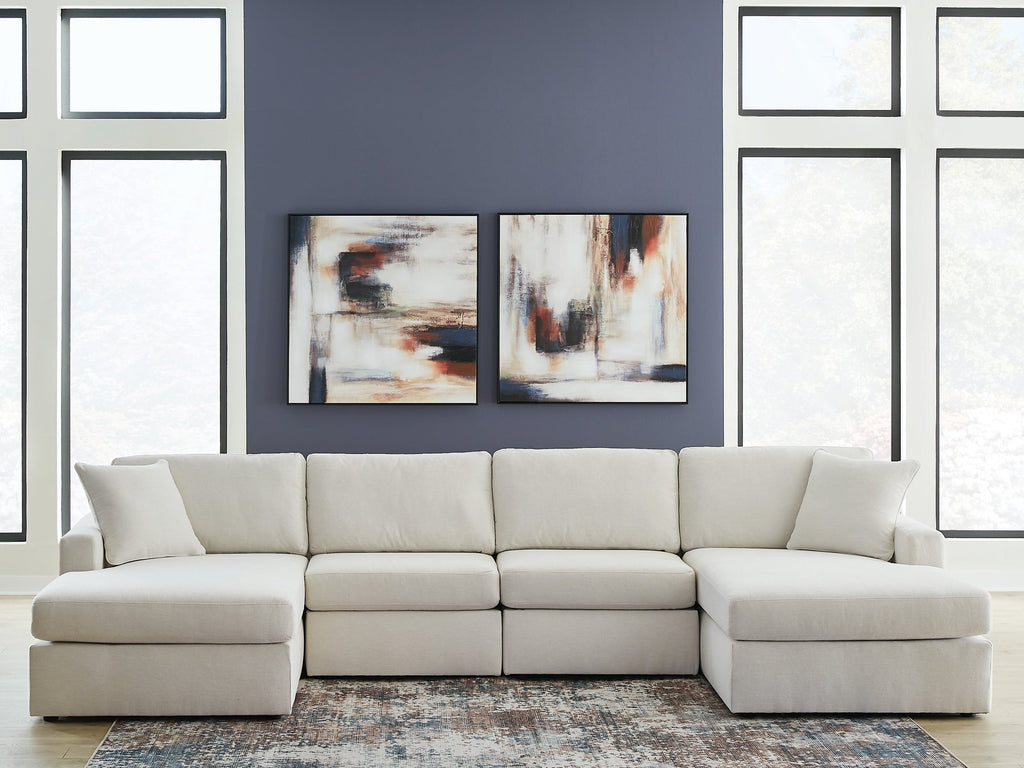 Ashley Cream Modular U-Shaped Sectional sofa with plush cushions in a modern studio setting.