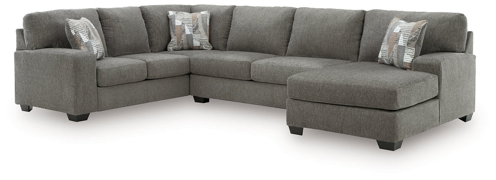 Grey Ashley U-shaped sectional sofa with plush cushions and modern design, shown in a stylish living room setting.